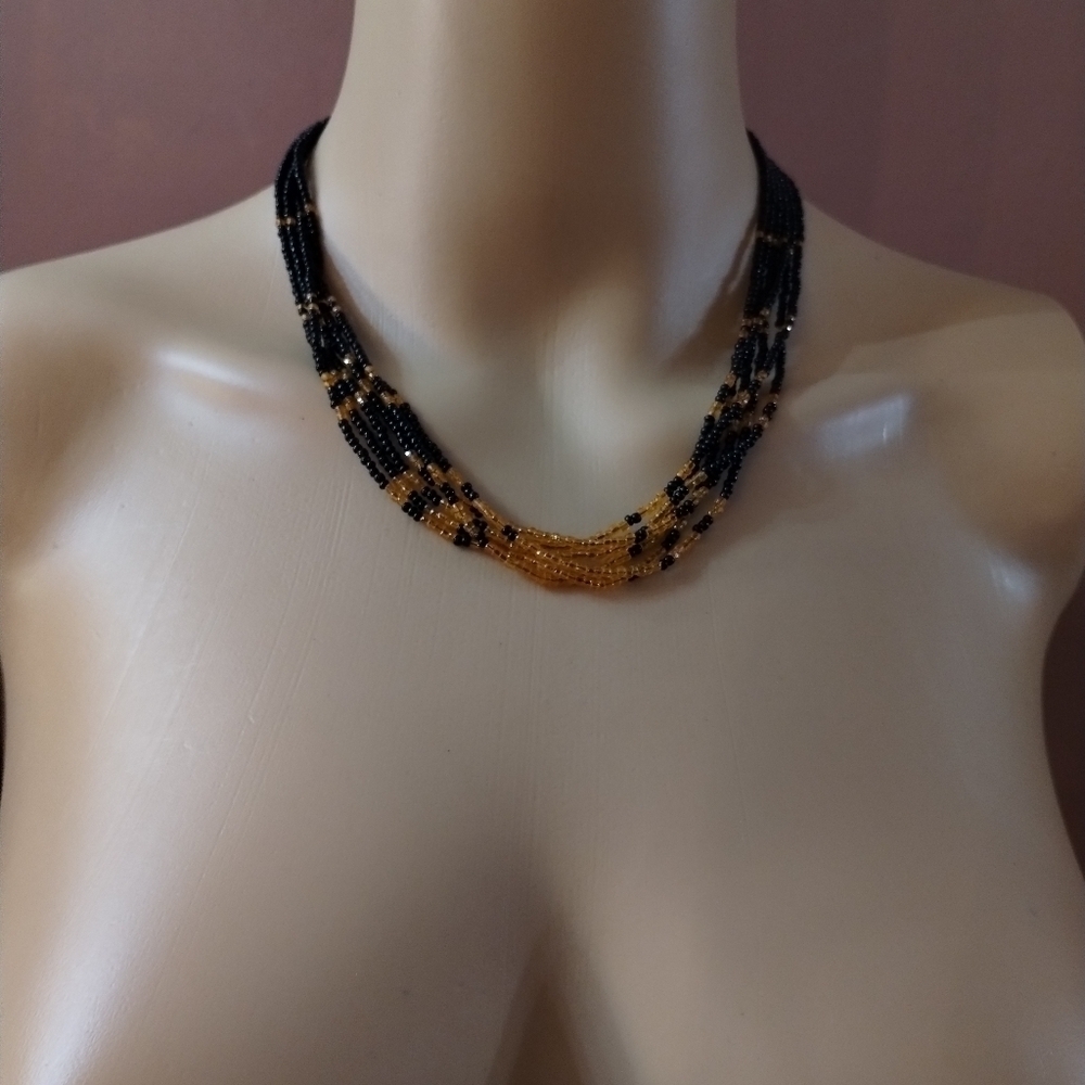 Women's black and yellow multi strand beaded necklace
